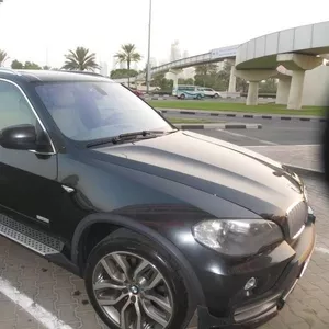 BMW X 5 Черный Цвет модели 2010 .. полный вариант./